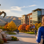 Boise State University-inspired campus with students walking through a modern university surrounded by autumn trees and mountains.